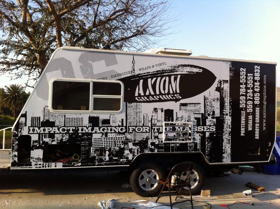 Black and white city-grunge wrapped concession trailer